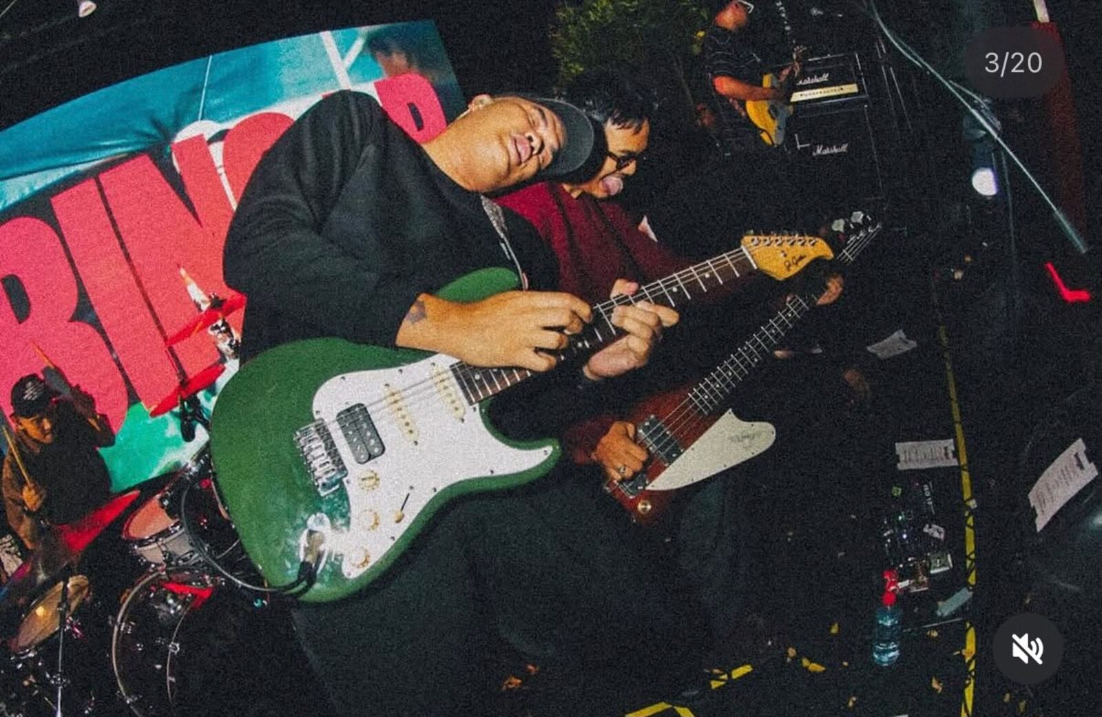 Guitarists live with Marshall amps